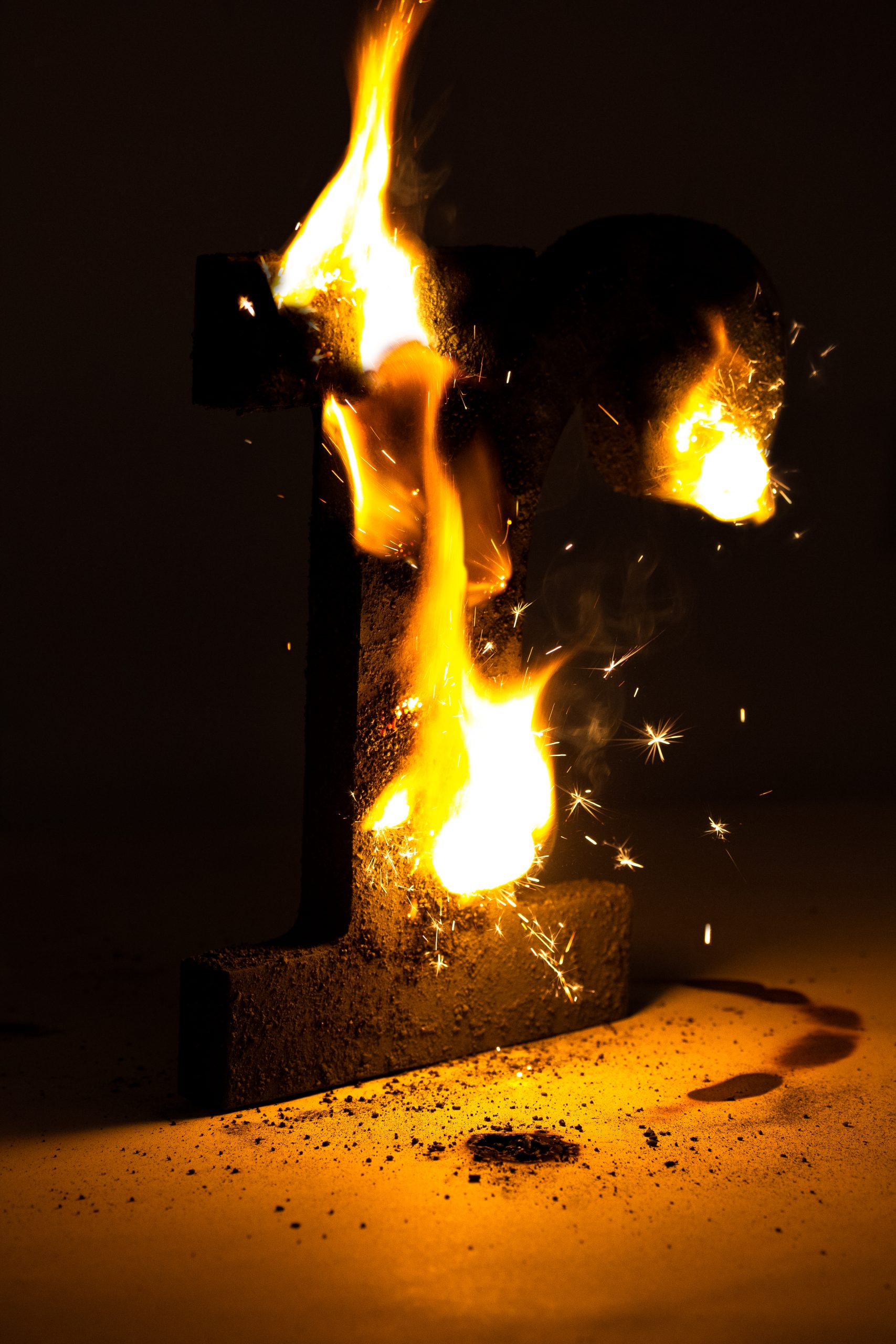 letter r on fire and sparks, burning, experimental packaging design